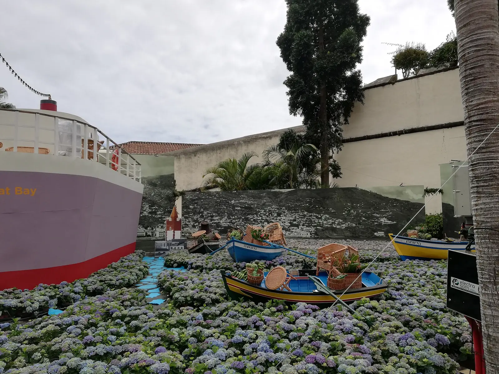 Flower display with boats made of hydrangeas at the Festa da Flor in Funchal