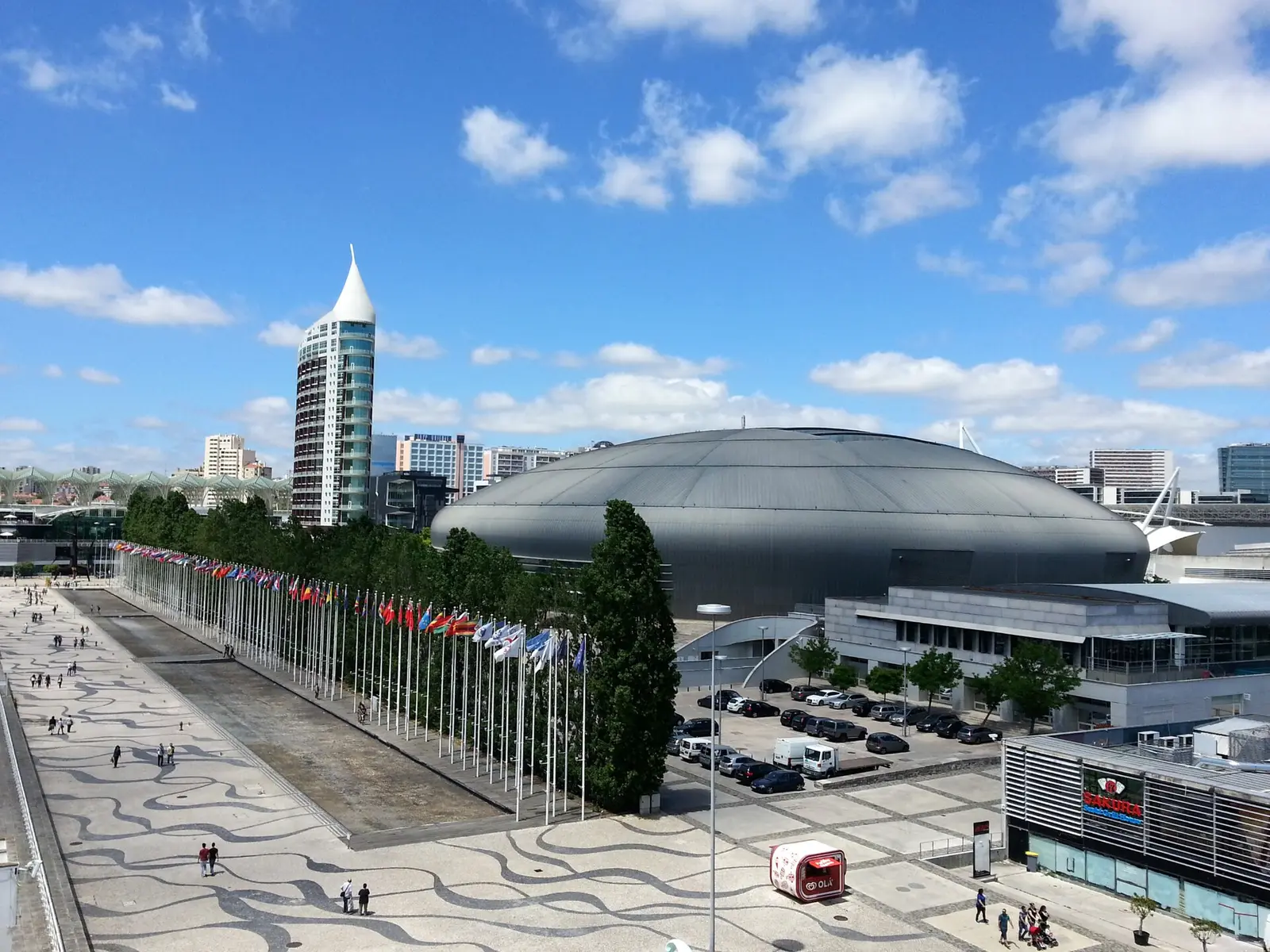 MEO Arena seen across the flag-lined esplanade in Parque das Nações, Lisbon